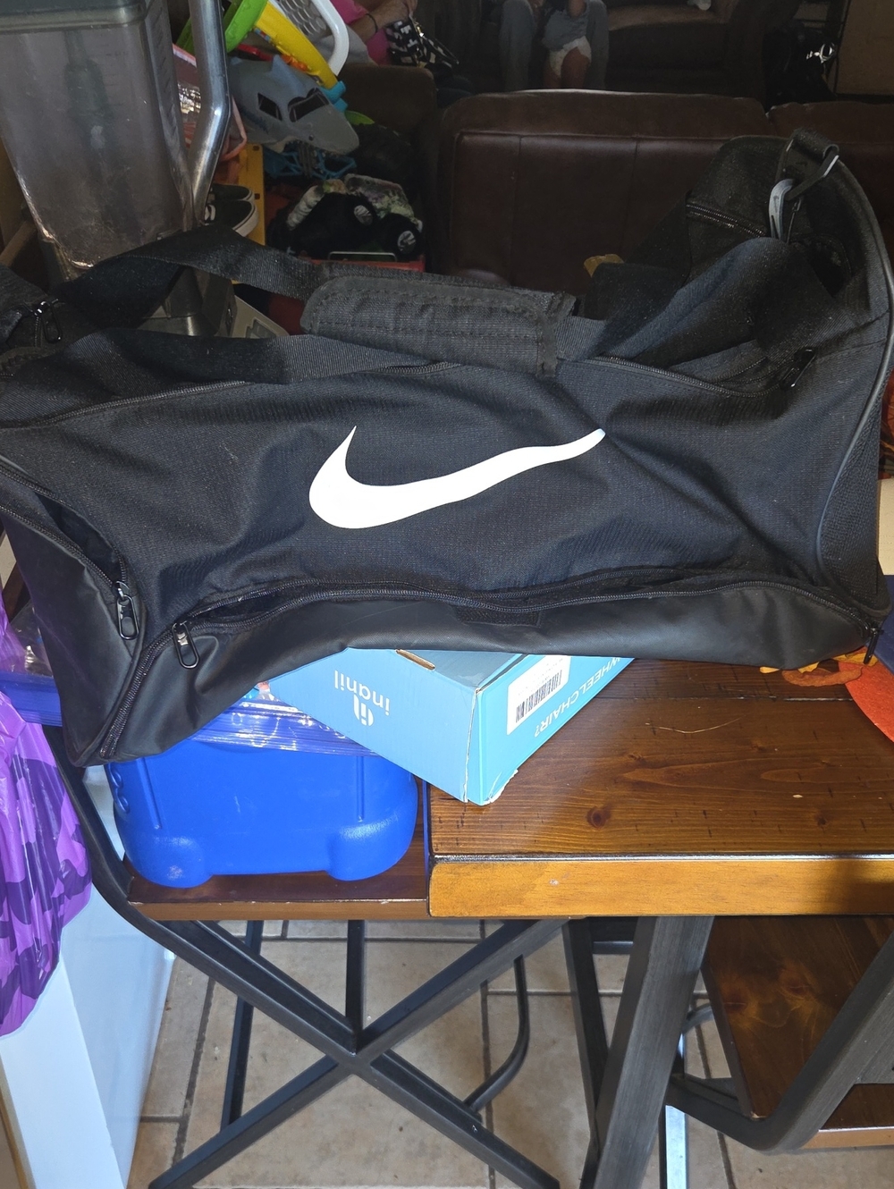 Nike Black Duffel Bag with White Swoosh